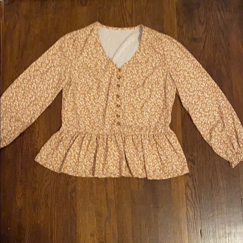 tan floral blouse